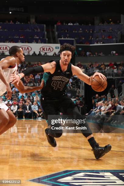 Frank Kaminsky of the Charlotte Hornets handles the ball against the Cleveland Cavaliers on March 28, 2018 at Spectrum Center in Charlotte, North...