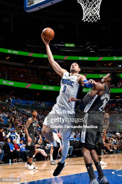 Nikola Vucevic of the Orlando Magic shoots the ball against the Brooklyn Nets on March 28, 2018 at Amway Center in Orlando, Florida. NOTE TO USER:...