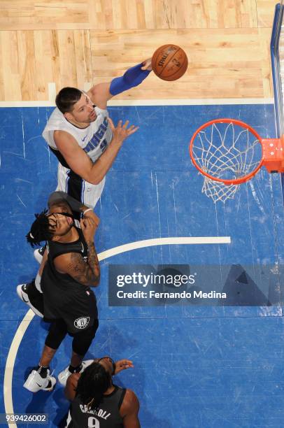 Nikola Vucevic of the Orlando Magic shoots the ball against the Brooklyn Nets on March 28, 2018 at Amway Center in Orlando, Florida. NOTE TO USER:...