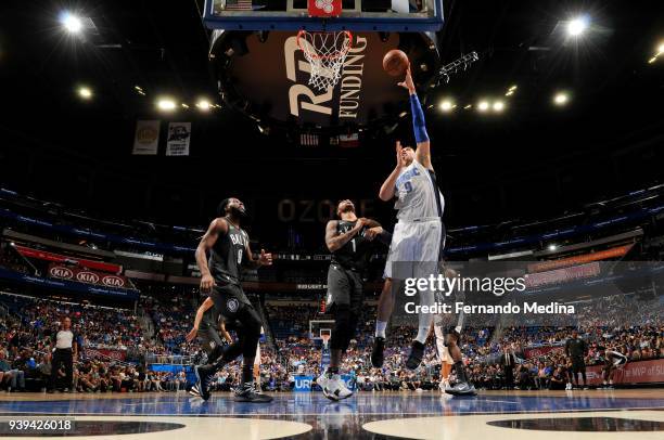 Nikola Vucevic of the Orlando Magic shoots the ball against the Brooklyn Nets on March 28, 2018 at Amway Center in Orlando, Florida. NOTE TO USER:...