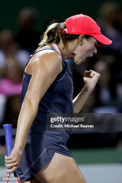 Danielle Collins of the United States reacts after a point against Venus Williams of the United States during their quarterfinal match on Day 10 of...