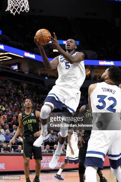 Gorgui Dieng of the Minnesota Timberwolves goes to the basket against the Atlanta Hawks on March 28, 2018 at Target Center in Minneapolis, Minnesota....