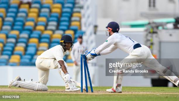 Delray Rawlins of MCC stumped by James Foster of Essex during Day Two of the MCC Champion County Match, MCC v ESSEX on March 28, 2018 in Bridgetown,...