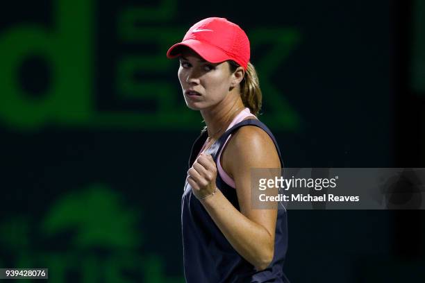Danielle Collins of the United States reacts after a point against Venus Williams of the United States during their quarterfinal match on Day 10 of...