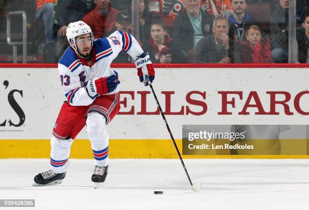 Mika Zibanejad of the New York Rangers skates the puck against the Philadelphia Flyers on March 22, 2018 at the Wells Fargo Center in Philadelphia,...