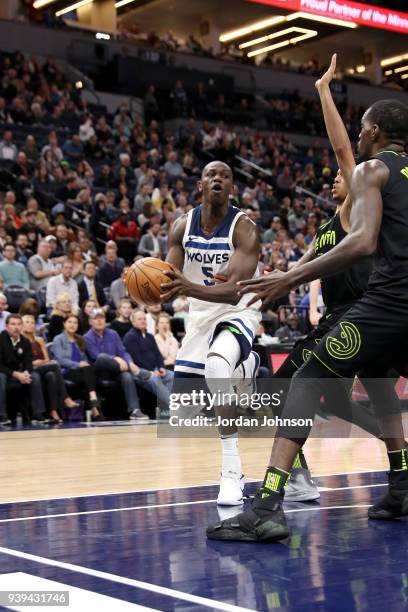 Gorgui Dieng of the Minnesota Timberwolves handles the ball against the Atlanta Hawks on March 28, 2018 at Target Center in Minneapolis, Minnesota....