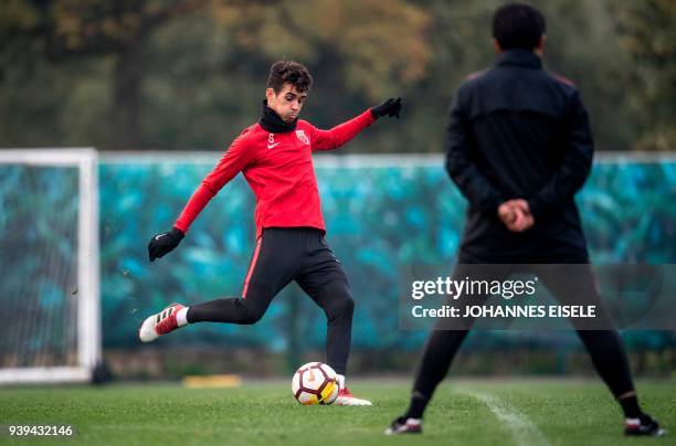 This picture taken on March 21, 2018 shows Shanghai's SIPG midfielder Brazilian Oscar hits the ball during a training session in Shanghai. / AFP...