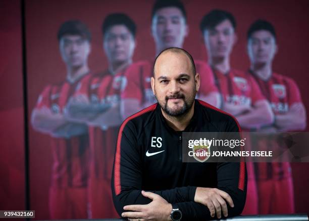 This picture taken on March 15, 2018 shows Shanghai's SIPG' doctor Brazilian Eduardo Santos posing for a portrait in Shanghai. / TO GO WITH Shanghai...