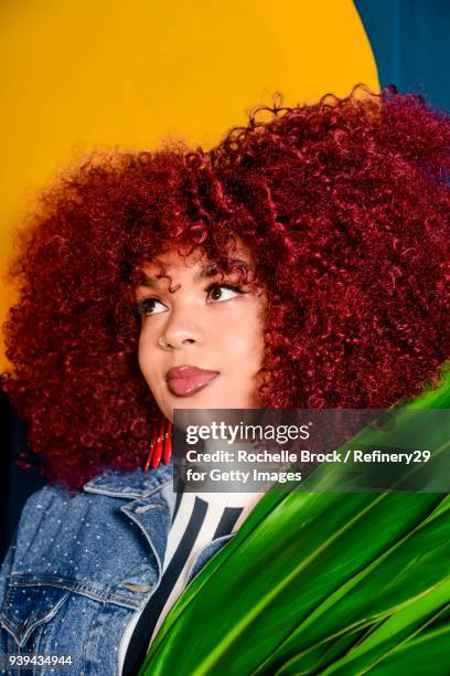 Beauty Portrait of Young Confident Woman with Natural Hair