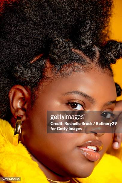 Beauty Portrait of Young Confident Woman with Bantu Knots