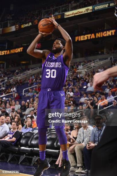 Troy Daniels of the Phoenix Suns shoots the ball against the LA Clippers on March 28, 2018 at Talking Stick Resort Arena in Phoenix, Arizona. NOTE TO...