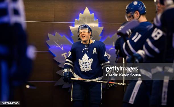 Morgan Rielly of the Toronto Maple Leafs stands in the locker room prior to playing the Detroit Red Wings at the Air Canada Centre on March 24, 2018...