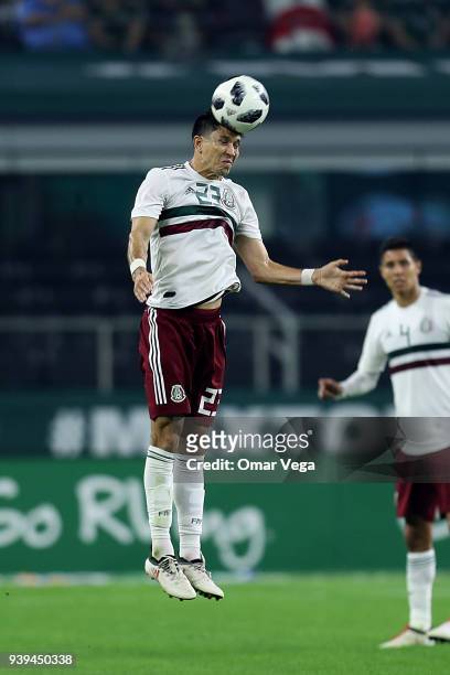 Jesus Molina of Mexico heads the ball during the international friendly match between Mexico and Croatia at AT&T Stadium on March 27, 2018 in...