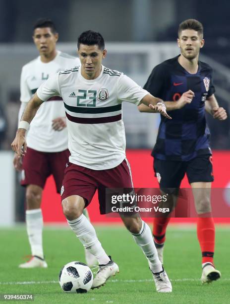 Raul Molina of Mexico drives the ball during the international friendly match between Mexico and Croatia at AT&T Stadium on March 27, 2018 in...