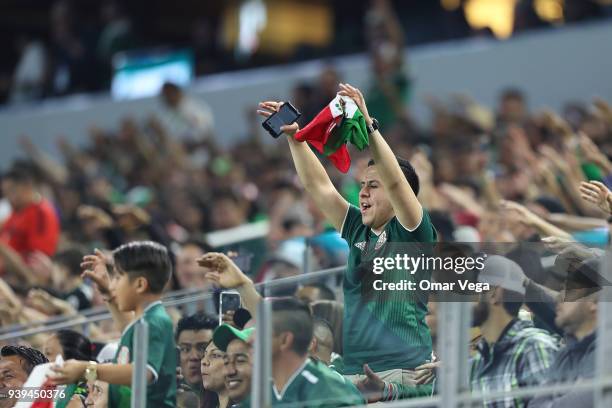 Fans of Mexico make the wave during the international friendly match between Mexico and Croatia at AT&T Stadium on March 27, 2018 in Arlington, Texas.