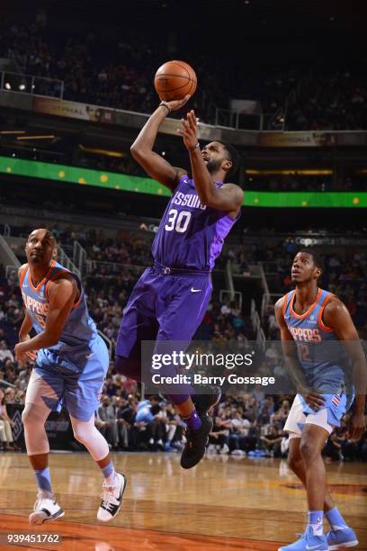 Troy Daniels of the Phoenix Suns shoots the ball against the LA Clippers on March 28, 2018 at Talking Stick Resort Arena in Phoenix, Arizona. NOTE TO...