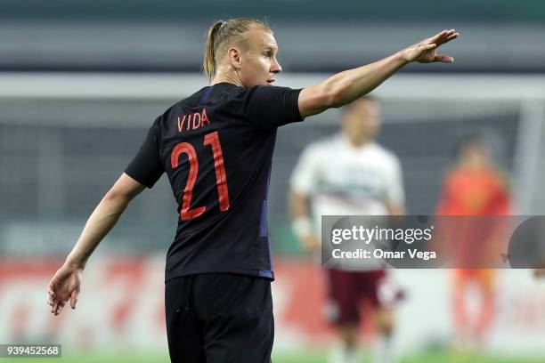 Domagoj Vida of Croatia gestures during the international friendly match between Mexico and Croatia at AT&T Stadium on March 27, 2018 in Arlington,...