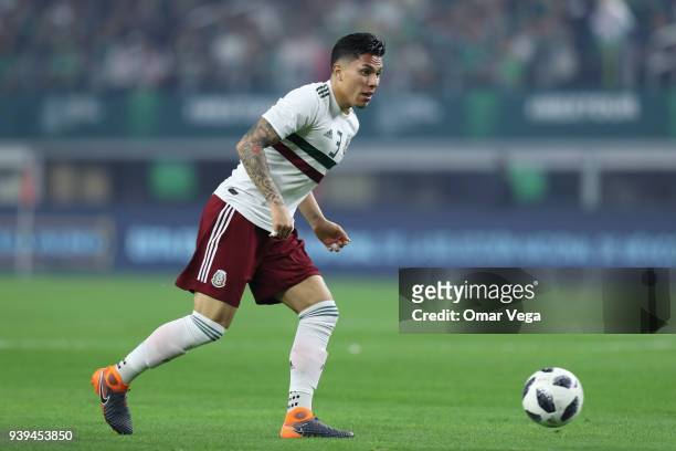 Carlos Salcedo of Mexico drives the ball during the international friendly match between Mexico and Croatia at AT&T Stadium on March 27, 2018 in...