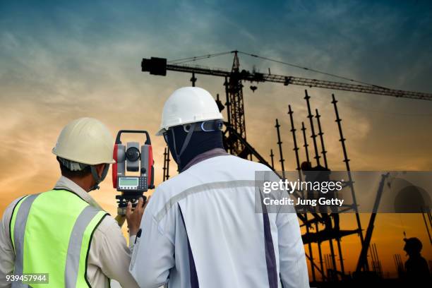 aerial view oil refinery.industrial view at oil refinery plant form industry zone with sunset and cloudy sky. - tacheometer stock pictures, royalty-free photos & images