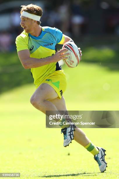 Ben O'Donnell of Australia runs the ball during the Australian Rugby Sevens practice match against New Zealand at Newington College on March 29, 2018...