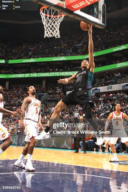 Jeremy Lamb of the Charlotte Hornets dunks against the Cleveland Cavaliers on March 28, 2018 at Spectrum Center in Charlotte, North Carolina. NOTE TO...