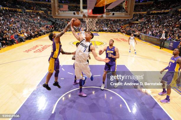 Brandon Ingram of the Los Angeles Lakers blocks the shot by Dwight Powell of the Dallas Mavericks during the game between the two teams on March 28,...