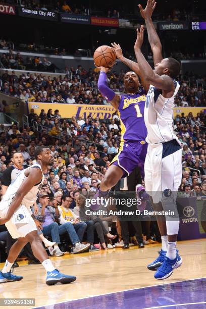 Kentavious Caldwell-Pope of the Los Angeles Lakers shoots the ball during the game against the Dallas Mavericks on March 28, 2018 at STAPLES Center...