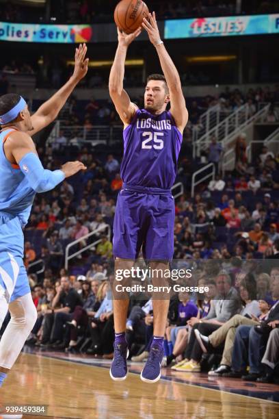 Alec Peters of the Phoenix Suns shoots the ball against the LA Clippers on March 28, 2018 at Talking Stick Resort Arena in Phoenix, Arizona. NOTE TO...