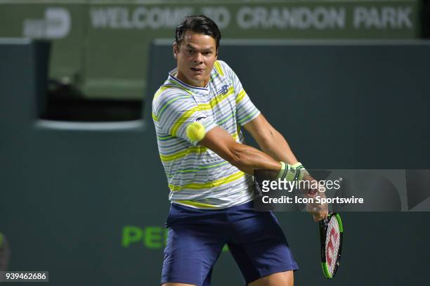 Milos Raonic in action during day 10 of the 2018 Miami Open held at the Crandon Park Tennis Center on March 28 in in Key Biscayne, Florida.