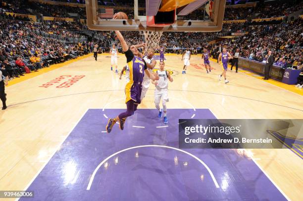 Lonzo Ball of the Los Angeles Lakers dunks the ball during the game against the Dallas Mavericks on March 28, 2018 at STAPLES Center in Los Angeles,...