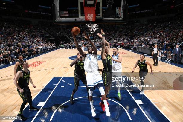 Gorgui Dieng of the Minnesota Timberwolves dunks against the Atlanta Hawks on March 28, 2018 at Target Center in Minneapolis, Minnesota. NOTE TO...