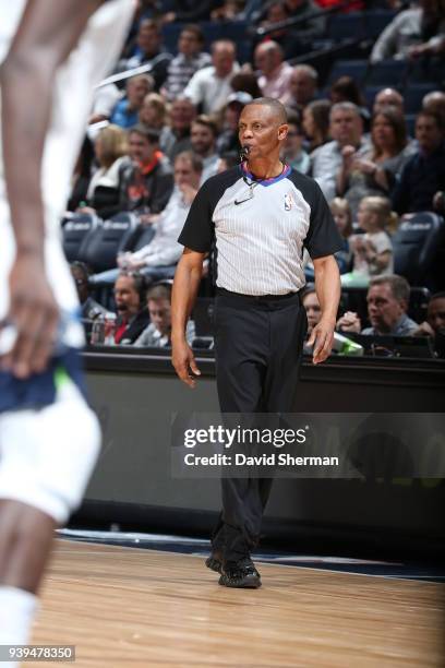 Referee Michael Smith looks on during the game between the Atlanta Hawks and the Minnesota Timberwolves on March 28, 2018 at Target Center in...