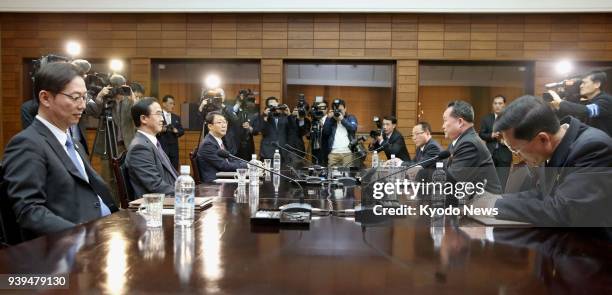 South Korean Unification Minister Cho Myoung Gyon and Ri Son Gwon , chairman of North Korea's Committee for the Peaceful Reunification of the...