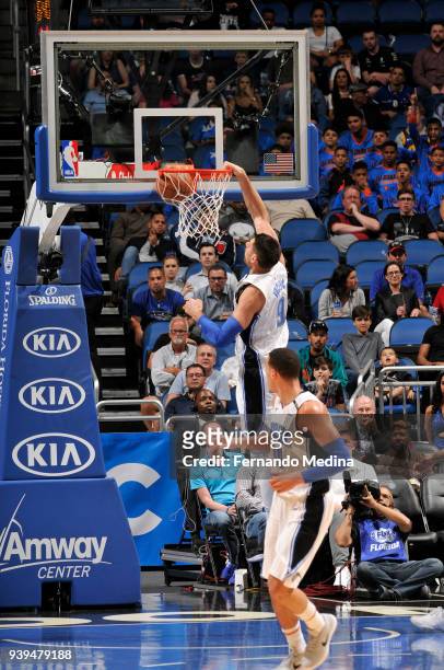 Nikola Vucevic of the Orlando Magic dunks the ball against the Brooklyn Nets on March 28, 2018 at Amway Center in Orlando, Florida. NOTE TO USER:...