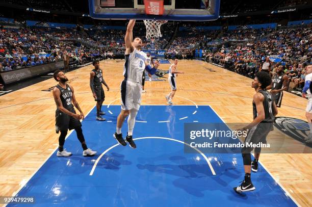 Nikola Vucevic of the Orlando Magic dunks the ball against the Brooklyn Nets on March 28, 2018 at Amway Center in Orlando, Florida. NOTE TO USER:...