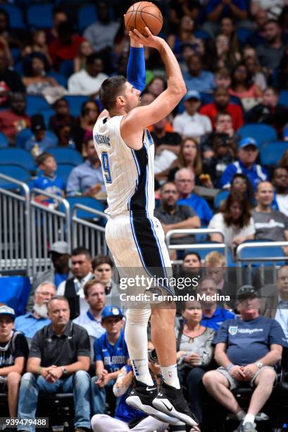 Nikola Vucevic of the Orlando Magic shoots the ball against the Brooklyn Nets on March 28, 2018 at Amway Center in Orlando, Florida. NOTE TO USER:...