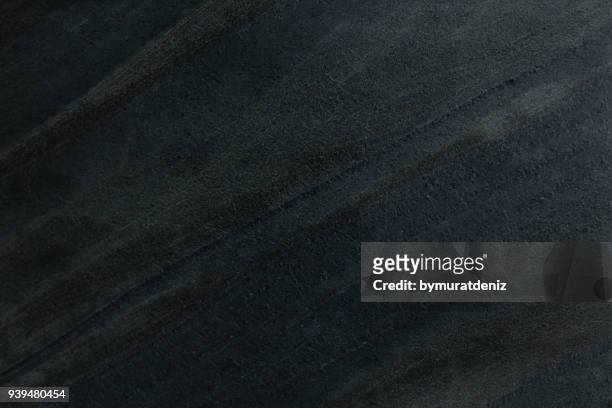 donkere stenen achtergrond - zwarte kleur stockfoto's en -beelden