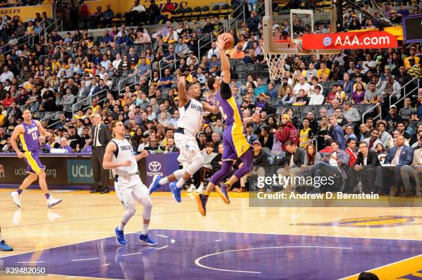 Lonzo Ball of the Los Angeles Lakers dunks the ball during the game against the Dallas Mavericks on March 28, 2018 at STAPLES Center in Los Angeles,...