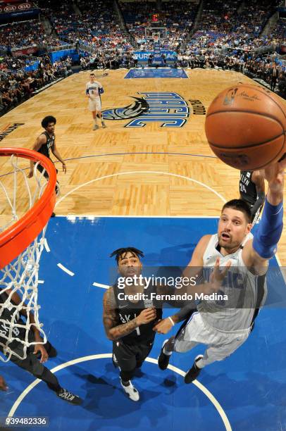 Nikola Vucevic of the Orlando Magic shoots the ball against the Brooklyn Nets on March 28, 2018 at Amway Center in Orlando, Florida. NOTE TO USER:...