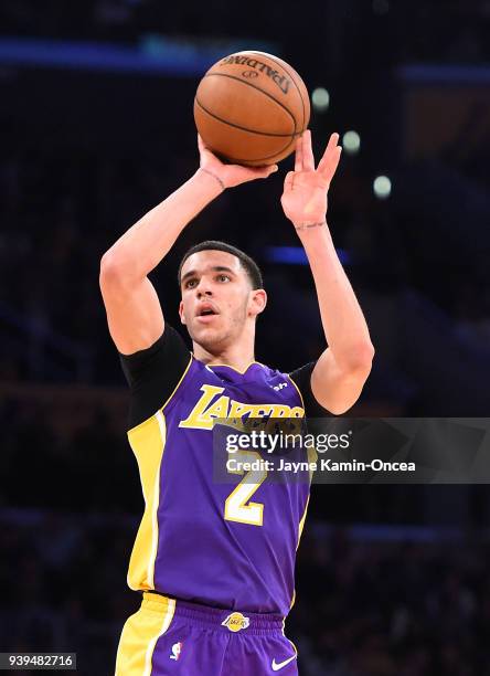 Lonzo Ball of the Los Angeles Lakers takes a jump shot in the second half of the game against the Dallas Mavericks at Staples Center on March 28,...