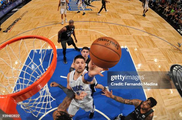 Nikola Vucevic of the Orlando Magic shoots the ball against the Brooklyn Nets on March 28, 2018 at Amway Center in Orlando, Florida. NOTE TO USER:...