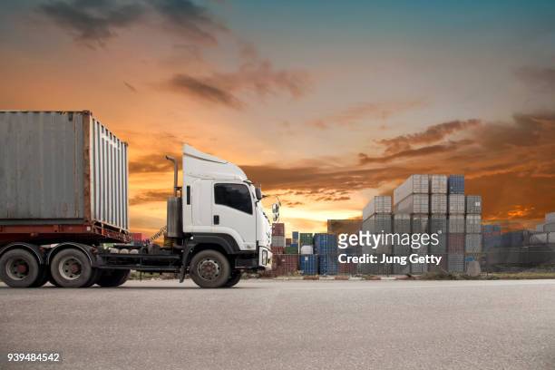 industrial container cargo freight ship for logistic import export concept beautiful sunset nature background - truck stock pictures, royalty-free photos & images
