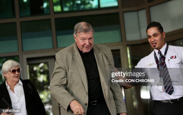 Cardinal George Pell leaves the court during his hearing at the Melbourne Magistrates Court in Melbourne on March 29, 2018. The 76-year-old Pell, who...