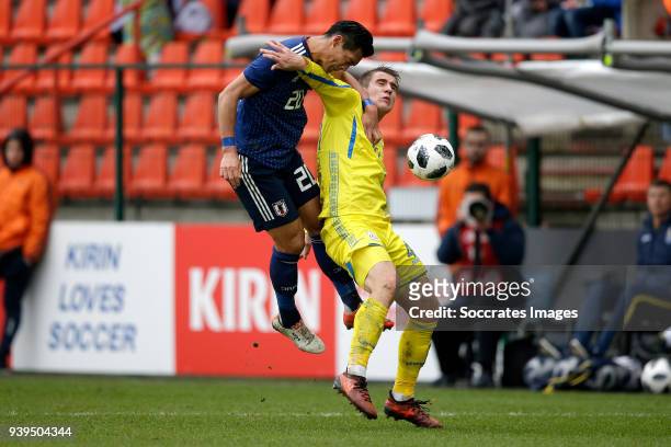 Tomoaki Makino of Japan, Yaroslav Rakitskiy of Ukraine during the International Friendly match between Japan v Ukraine at the Stade Maurice Dufrasne...