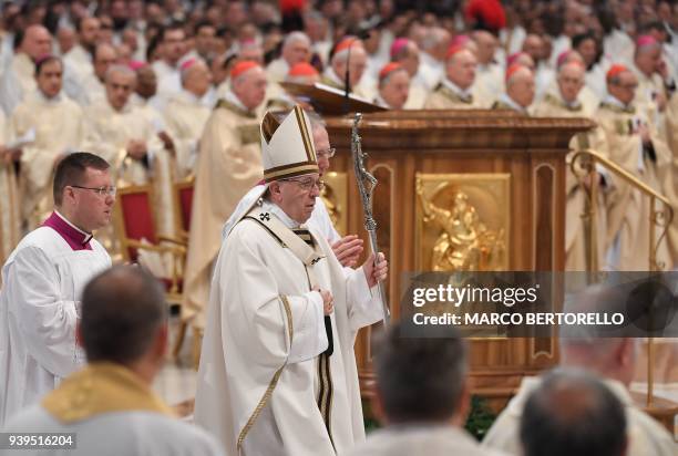 Pope Francis leads the Holy Chrism Mass on Maundy Thursday on March 29, 2018 at St Peter's basilica in Vatican. Christians around the world are...