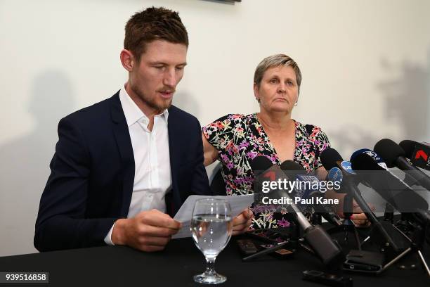 Christina Matthews consoles Australian test Cricket player Cameron Bancroft while addressing the media at the WACA on March 29, 2018 in Perth,...