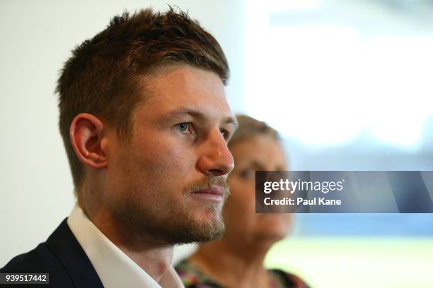 Australian test Cricket player Cameron Bancroft addresses the media with WACA CEO Christina Matthews at the WACA on March 29, 2018 in Perth,...