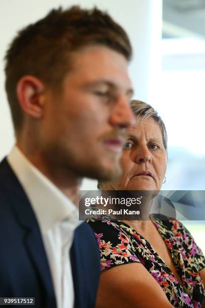 Australian test Cricket player Cameron Bancroft addresses the media with WACA CEO Christina Matthews at the WACA on March 29, 2018 in Perth,...