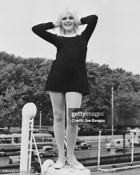 Norwegian singer Gro Anita Schonn abroad the HMS 'Chrysanthemum', UK, 11th July 1968.
