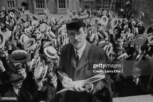 British actor Peter O'Toole as 'Arthur Chipping' in musical film 'Goodbye, Mr Chips' with schoolboys at Sherborne School, UK, 17th July 1968.